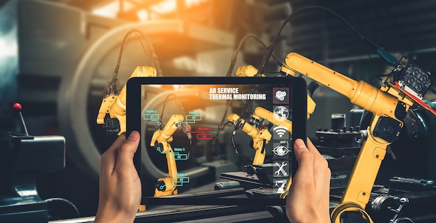 Ingenieur bestuurt robotarmen door augmented reality-industrietechnologie