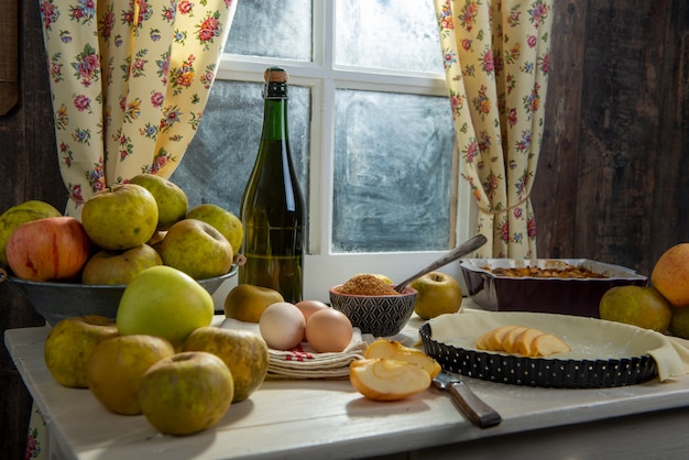 Ingredients for apple pie, apples, eggs, dough