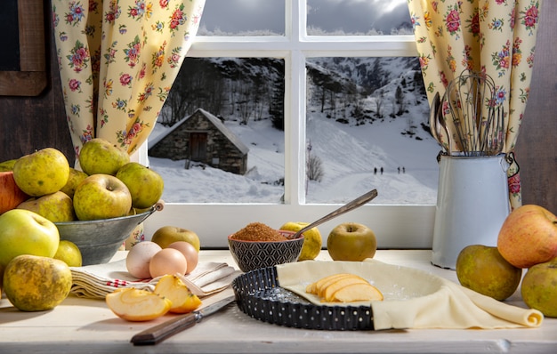 Ingredients for apple pie, apples, eggs, dough