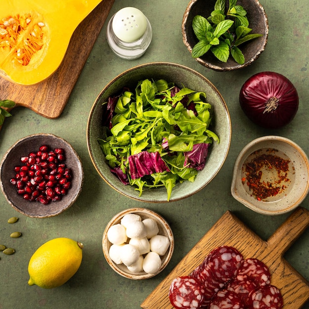 Ingredients for baked pumpkin salad chorizo and mozzarella The concept of healthy eating Top view