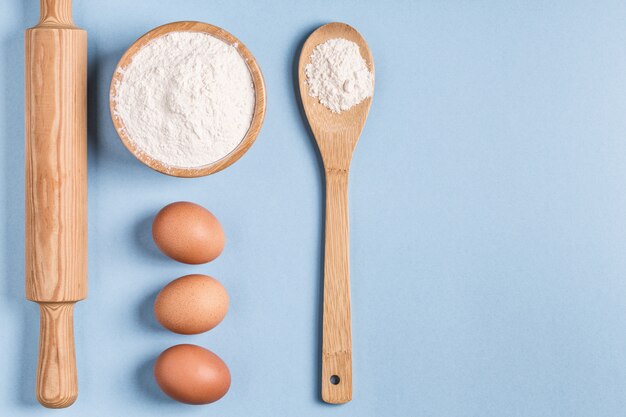 Ingredients for baking on a blue background