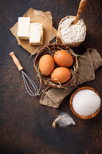 Ingredients for baking. Butter, eggs, sugar and flour 