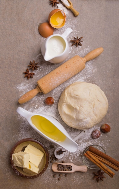 Photo the ingredients for baking cupcake with raisins.