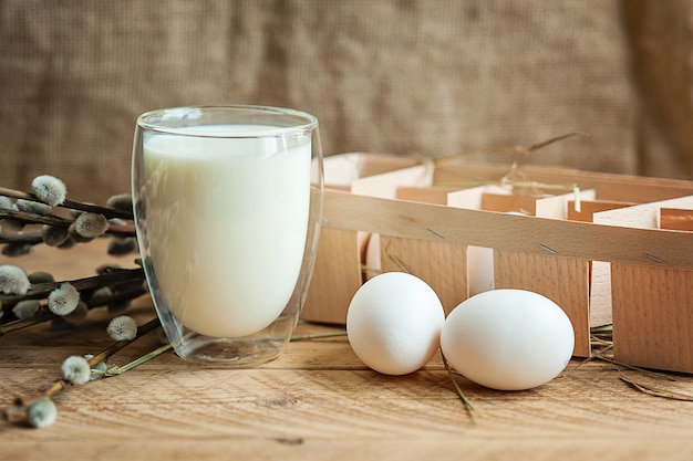 Ingredients for baking easter cake on wooden background