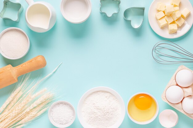 Ingredients for baking on light blue background