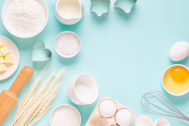 Ingredients for baking on light blue background