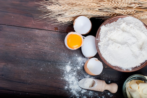 Ingredients for baking on the old wooden table 