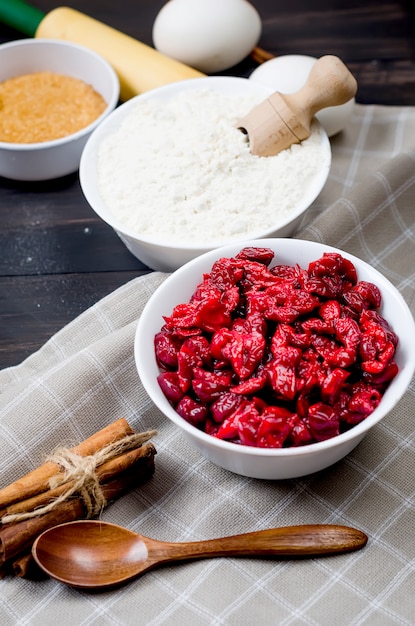 Ingredients for baking pie with cherry