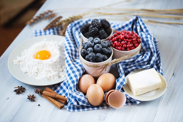 ingredients for berry pie on table