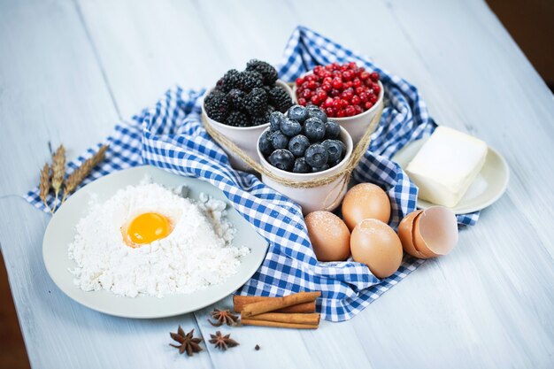 ingredients for berry pie on table