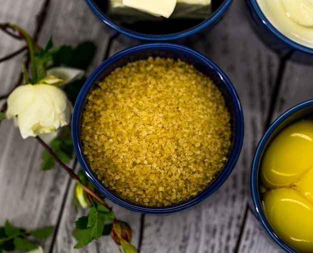 ingredients for cheesecake , in a bowl