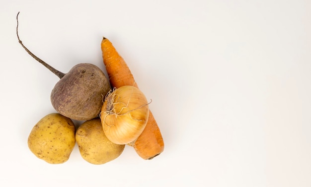 Ingredients closeup beets carrots potatoes Isolated on white background A set of products for cooking