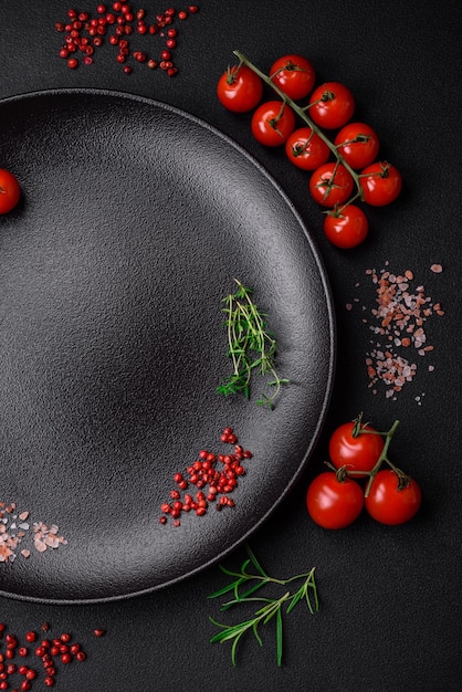 Ingredients for cooking cherry tomatoes salt spices and herbs