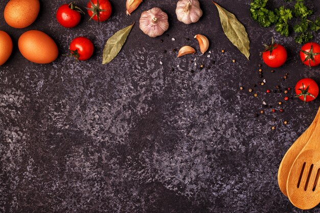 Photo ingredients for cooking on dark background