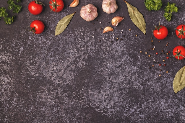 Ingredients for cooking on dark concrete background