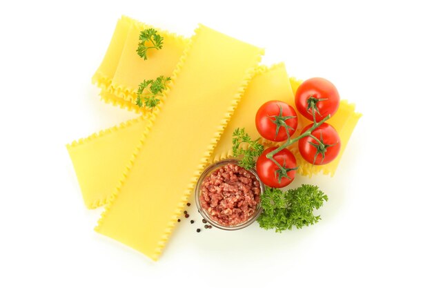 Photo ingredients for cooking lasagna isolated on white background