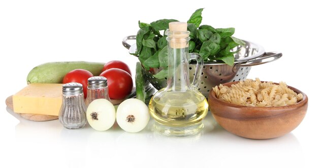 ingredients for cooking pasta isolated on white