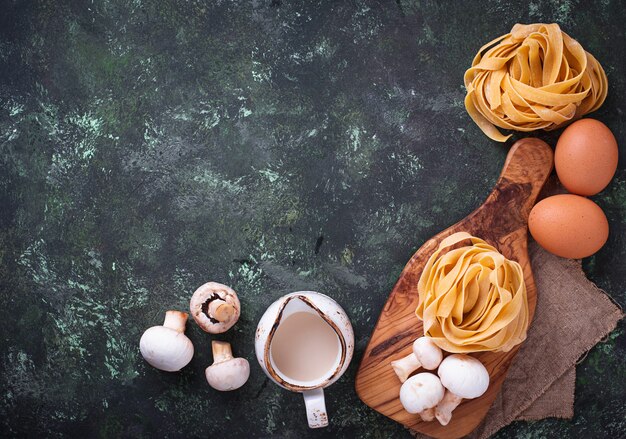 Ingredients for cooking pasta  with  mushrooms