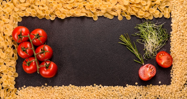 Ingredients for cooking paste. Cherry tomatoes, spices and herbs prepared for pasta