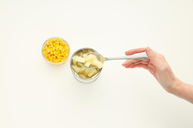 Ingredients for cooking salad corn seeds and canned pineapple