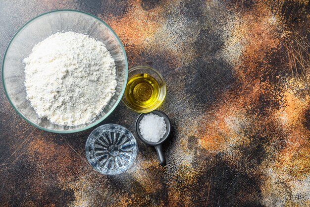 Ingredients for the dough, flour oil water and salt