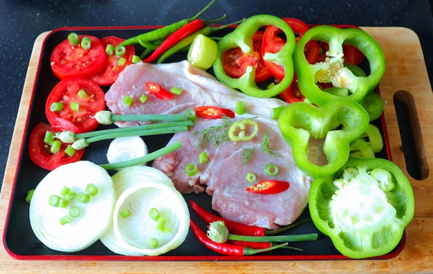 Ingredients for a festive dish meat with vegetables and spices