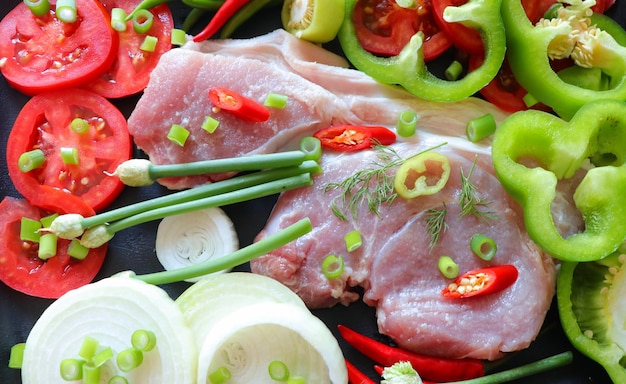 Ingredients for a festive dish meat with vegetables and spices