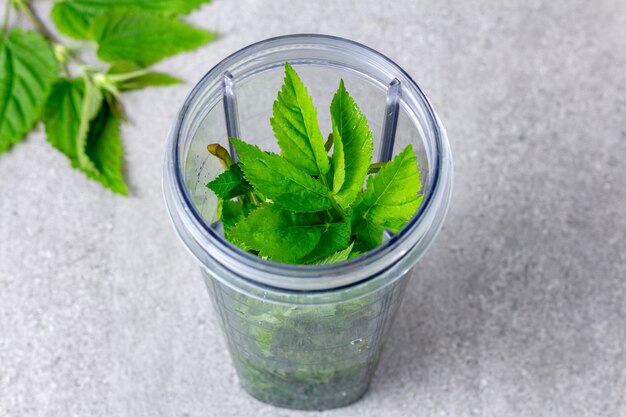 Ingredients for green smoothies in a blender