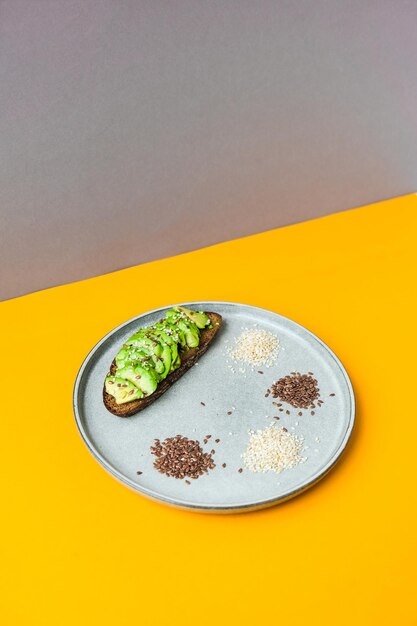 Ingredients for healthy avocado toast sesame flax seeds vegan keto diet healthy eating vegetari