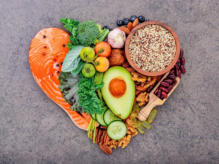 Photo ingredients for healthy foods selection on white wooden background.