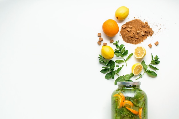 Photo ingredients for home made lemonade on white background