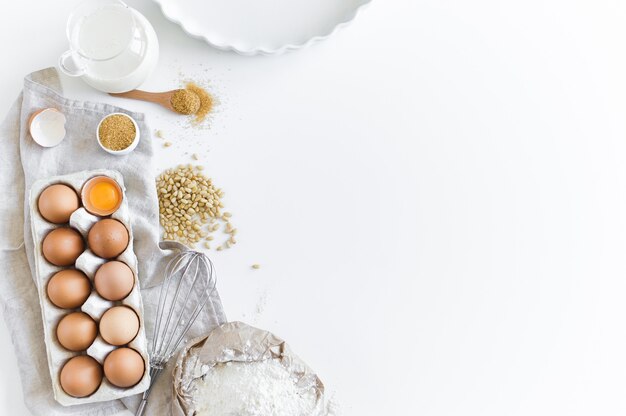 Ingredients for homemade baking. Eggs, milk, flour, sugar. 