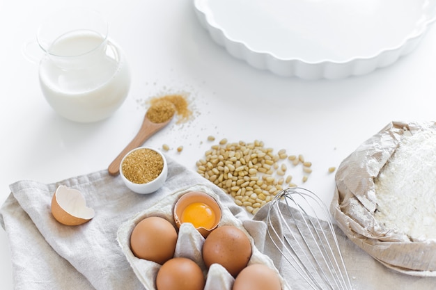 Ingredients for homemade baking. Eggs, milk, flour, sugar. 