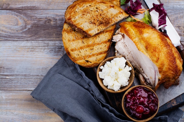 Ingredients for homemade turkey leftover sandwich with cranberry sauce