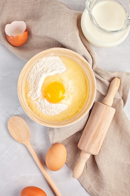 Ingredients and kitchen utensils for dough preparation