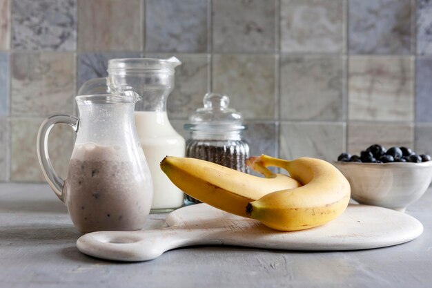 Ingredients for making banana smoothie Closeup selective focus