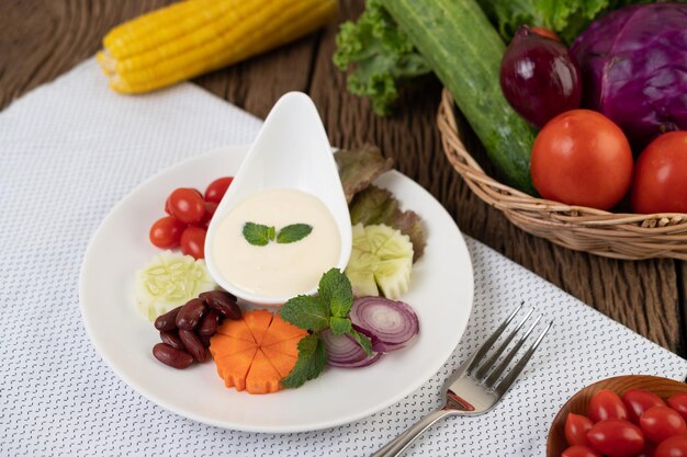 Ingredients for making salad and salad dressing in cups