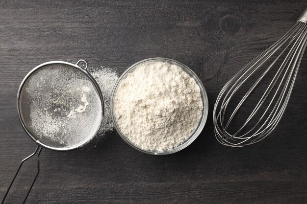 Ingredients for pie or cake cooking on wooden table