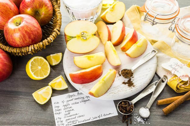 Ingredients for preparing homemade apple butter from organic apples.