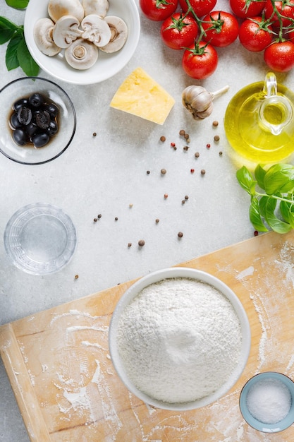 Ingredients and spices for making homemade pizza Top view