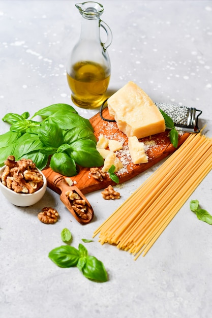 ingredients for traditional Italian pasta with pesto 