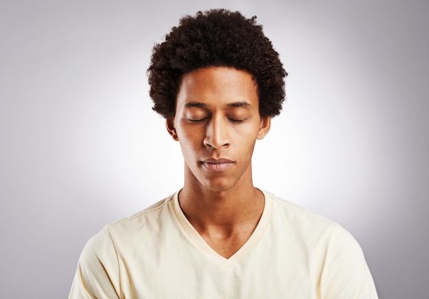 Inhale confidence exhale doubt Studio shot of a young man posing against a gray background