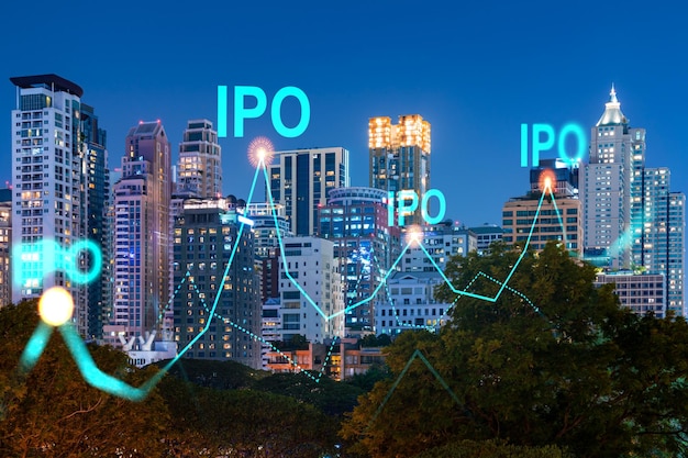 Initial public offering hologram night panoramic city view of Bangkok The financial center for multinational corporations in Asia The concept of boosting the growth by IPO process Double exposure