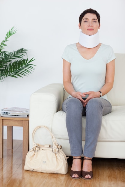 Injured Woman with a surgical collar