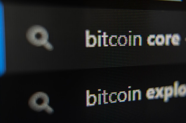 The inscription bitcoin on the monitor screen.