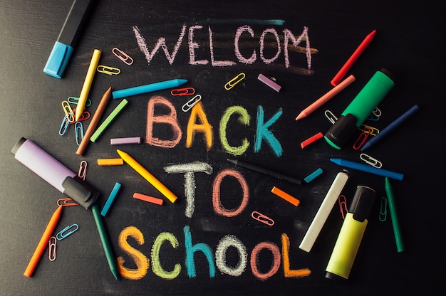 Photo the inscription on the blackboard colored chalk.