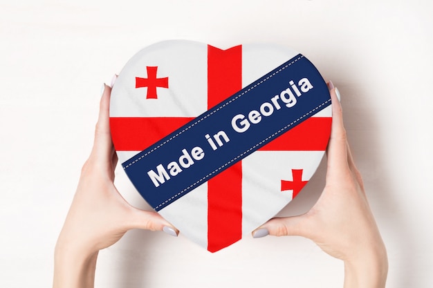 Inscription Made in Georgia, the flag of Georgia. 