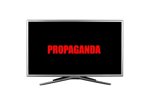 The inscription propaganda in the red color on a black TV screen isolated on a white background