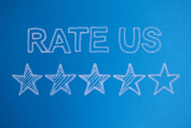 Photo inscription rate us and stars with customer reviews