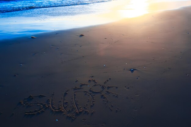 The inscription on the sand